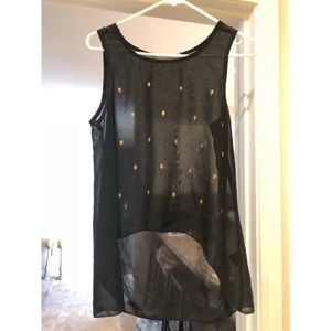 Black top with gold skulls